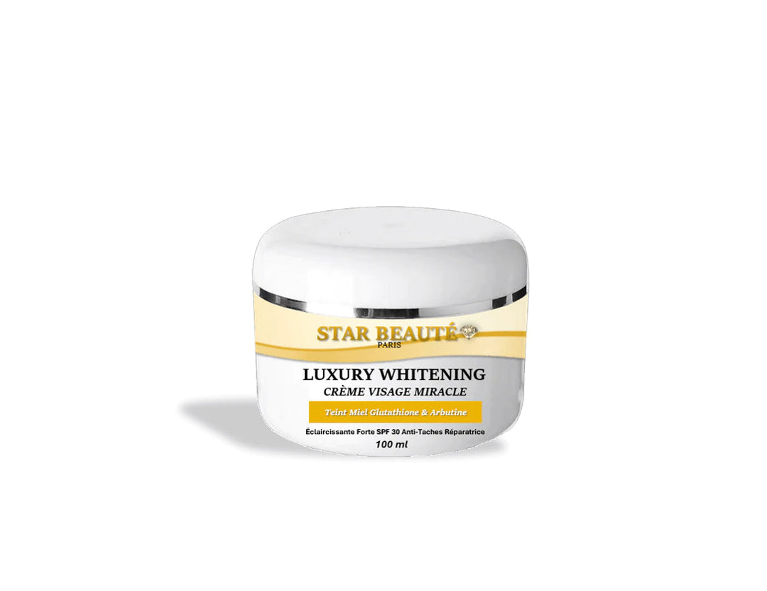 Crème Anti-Ageing Anti-Age Eclaircissant Whitening Black skin Visage Glutathione & Arbutine Miracle Teint Miel - Star Beauté Paris Organics Skin Care LUXURY WHITENING - Crème Visage MIRACLE Teint Miel Glutathione & Arbutine - 100ml SPF30 La crème visage MIRACLE est un mélange de plusieurs huiles nourrissantes et réparatrices, vitamines, collagène, arbutine, acides de fruits.